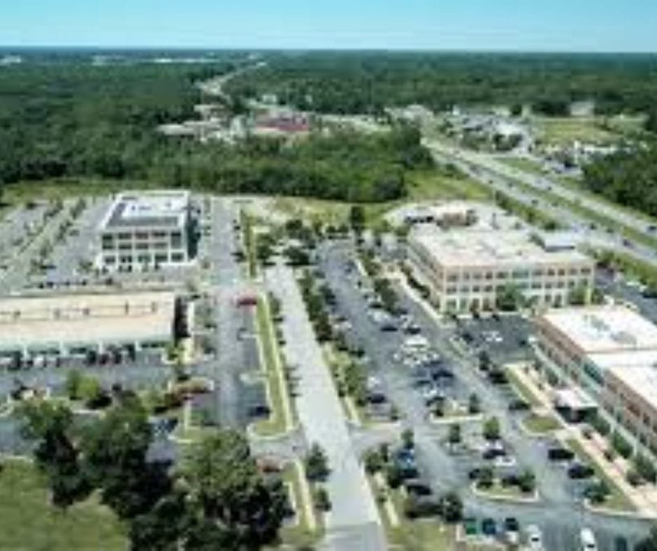 Aerial view of office buildings and commercial area along a highway in Waldorf, Maryland.