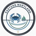 A circular logo for Eastern Maryland featuring a large blue crab and a small green sailboat on water waves.